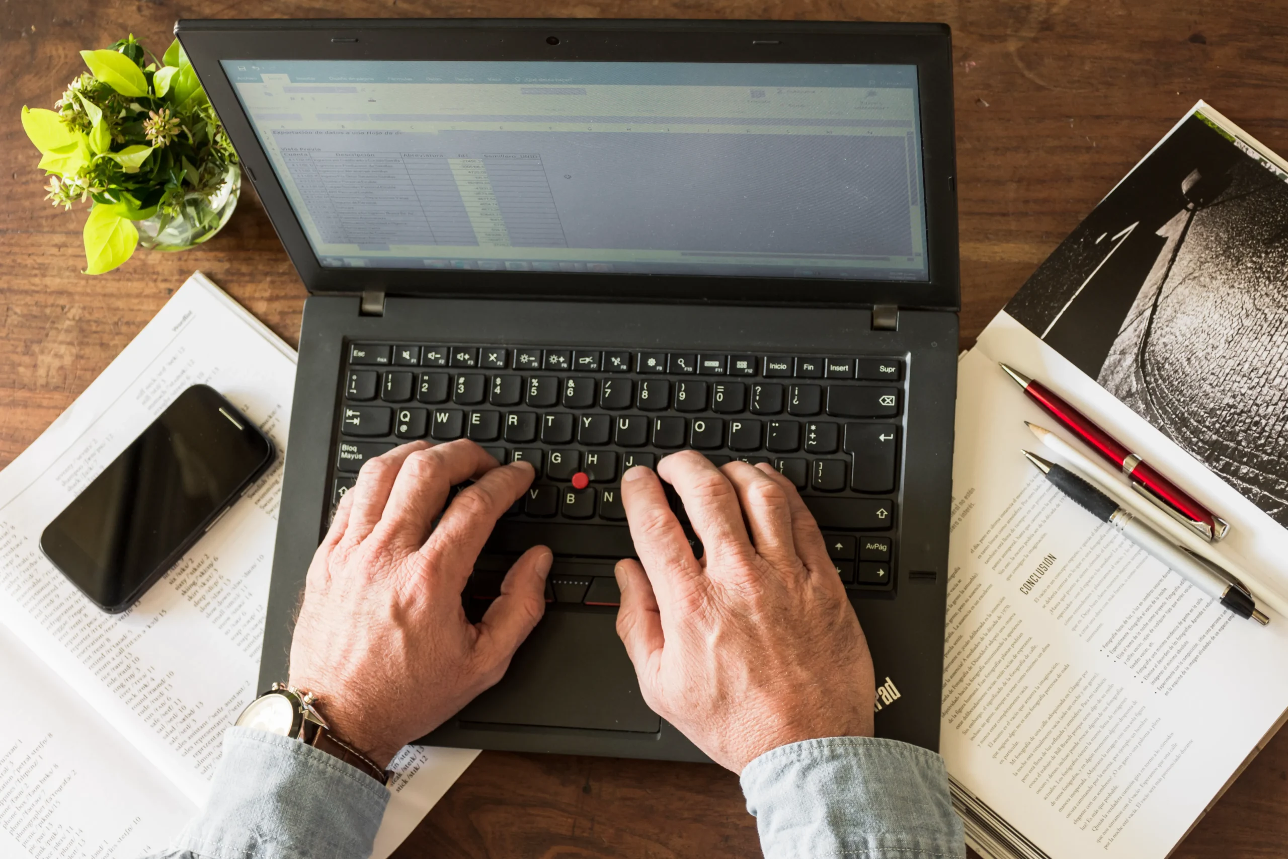 PhD mentor providing help with writing assignments for research students